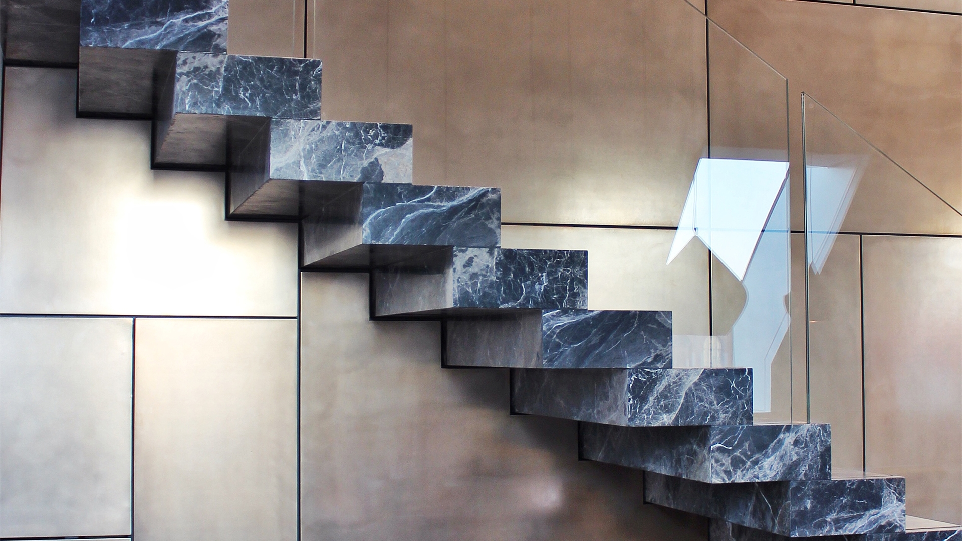 Luxurious wall surfaces made of real metal and precious materials
